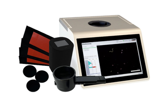 Portable measurement system for determining contamination on surfaces